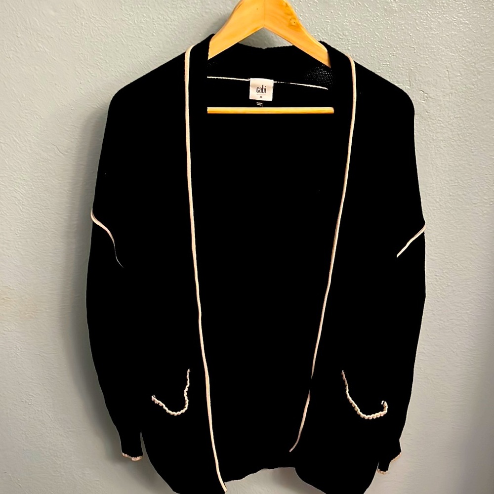 Black with cream piped stitching CAbi cardigan. Size Medium